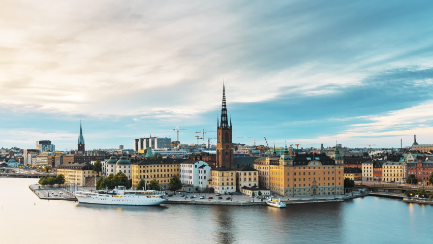Stockholm, Sweden. Scenic View Of Stockholm Skyline At Summer Evening. Famous Popular Destination Scenic Place In Dusk Lights. Riddarholm Church In Day To Night Transition Time Lapse. Royalty-Free Stock Footage #1092784235