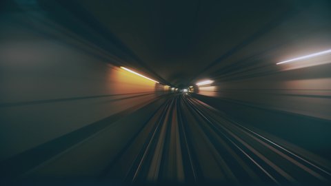 4k Timelapse Point Of View Fast Underground Train Riding In Tunnel Of Modern City. Subway Train Moving In Tunnel And Arriving To Station. Concept Of Modern Metro Underground Transport And Connection 库存视频