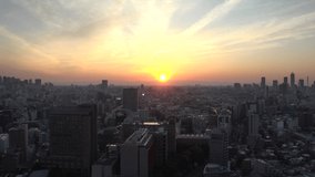 TOKYO, JAPAN - JUN 2020 : Aerial high angle sunrise view of CITYSCAPE of TOKYO around Shinjuku and Ikebukuro city. Long time lapse shot night to morning. Japanese urban metropolis in dawn. - Powered by Shutterstock - Get 15% off with code: PIKWIZARD15