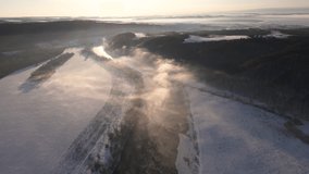 Cinematic Landscape Aerial Horizon View at Sunny Winter Day, Early Morning Sunrise Over River, 4k Drone Video
