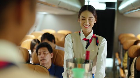 4k Asian Woman Flight Attendant Walking Stock Footage Video (100% ...