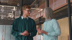 Teacher and student giving high five standing in office. Happy multi-ethnic business team, creative group of people raising hands up giving high five together celebrating winning, teamwork success.  - Powered by Shutterstock - Get 15% off with code: PIKWIZARD15