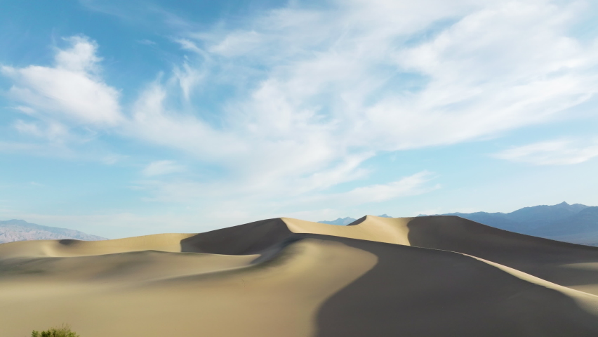 Panorama Of Sand Dunes Desert With Foot Marks In Death Valley National Park, Eastern California. Aerial Wide Shot