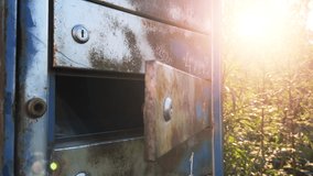 Old rusty abandoned mailbox among thickets outdoor in the Chernobyl exclusion zone - Powered by Shutterstock - Get 15% off with code: PIKWIZARD15