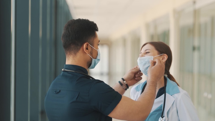 DOCTOR put on a medical mask | Shutterstock HD Video #1092818283