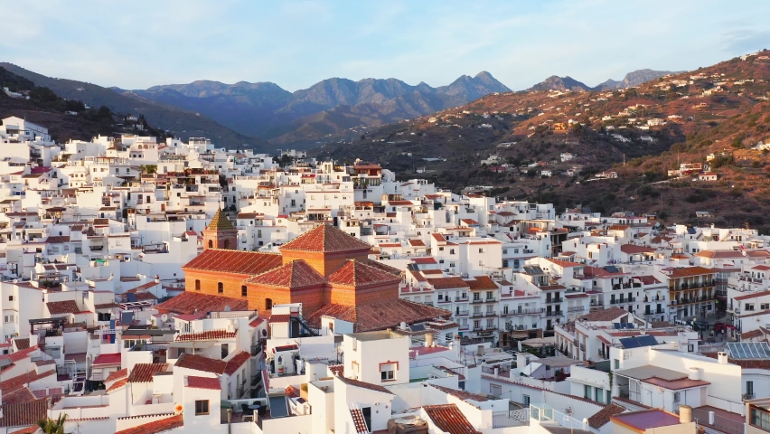 Aerial Drone View of Church in Spanish Town in Torrox, Spain, Costa Del Sol Mountains, Andalusia (Andalucia), Europe, White Buildings and Houses Popular in Property Real Estate Housing Market Royalty-Free Stock Footage #1092828649