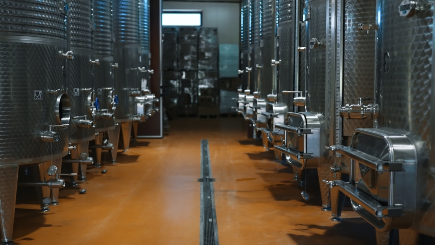 Modern wine factory interior with reservoirs.