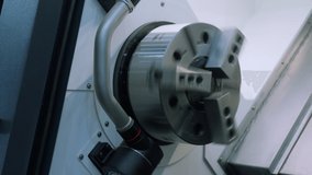 Rotating Metal machine with drum. Media. Rotating round part in production machine. Metal drum or parts rotate at factory - Powered by Shutterstock - Get 15% off with code: PIKWIZARD15