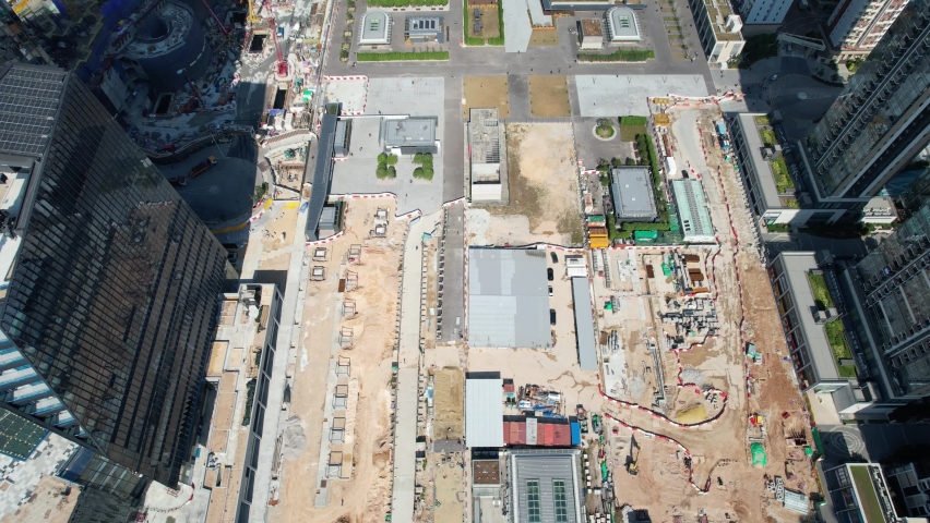 Sport theme commercial residential facility construction site in Kai Tak Hong Kong city, Kwun Tong and Kowloon Bay near Victoria harbor, Aerial drone | Shutterstock HD Video #1092850205