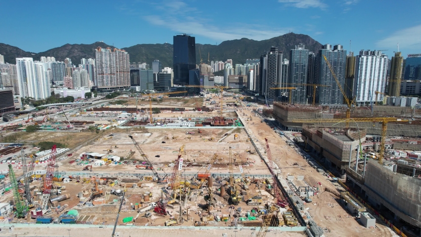 Sport theme commercial residential facility construction site in Kai Tak Hong Kong city, Kwun Tong and Kowloon Bay near Victoria harbor, Aerial drone | Shutterstock HD Video #1092850241