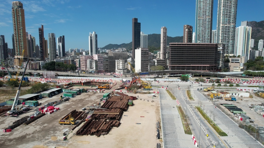 Sport theme commercial residential facility construction site in Kai Tak Hong Kong city, Kwun Tong and Kowloon Bay near Victoria harbor, Aerial drone | Shutterstock HD Video #1092850271