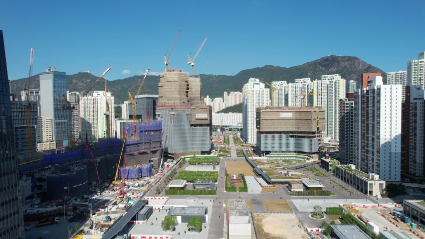 Sport theme commercial residential facility construction site in Kai Tak Hong Kong city, Kwun Tong and Kowloon Bay near Victoria harbor, Aerial drone | Shutterstock HD Video #1092850293