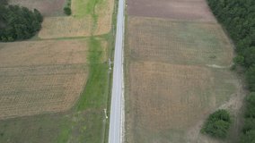 farmland, aerial rural farmland and empty road