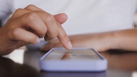 Person using smartphone, browsing through pictures on social network close up. - Powered by Shutterstock - Get 15% off with code: PIKWIZARD15