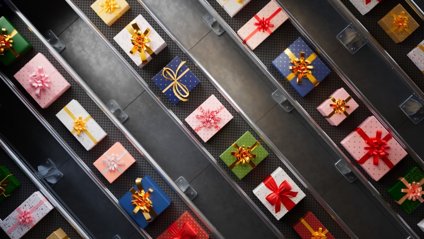 Countless beautiful, colourful gift boxes on a conveyor belt production line. Seamless, endless looping animation of presents in a factory being prepared for shipping. Christmas season preparations.