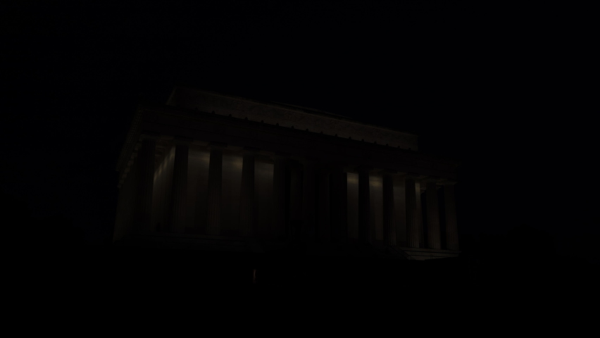 A time-lapse of sunrise at the Lincoln Memorial on a summer morning in Washington, DC. The morning sun brightens the scene and casts beautiful pink light on the marble columns and facade.