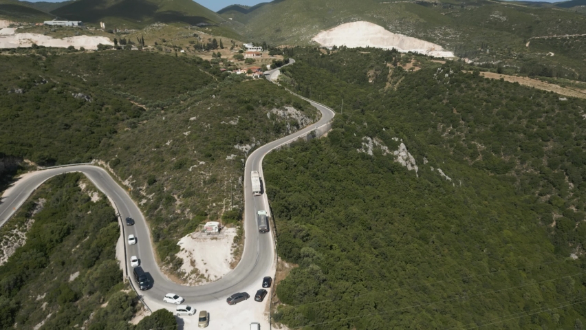 Aerial View Of Vehicles Driving On Uphill Winding Road In Zakynthos, Greece.