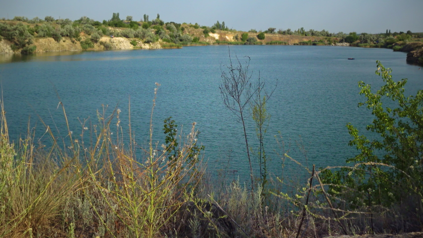 Flooded granite quarry. Freshwater lake