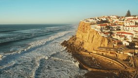 Aerial Drone View of Portugal Coastal Town with Houses in Housing Market in Sintra, Lisbon, Europe, Cliff Top Properties and Homes on Coast with Sea View at Praia Das Azenhas Beach