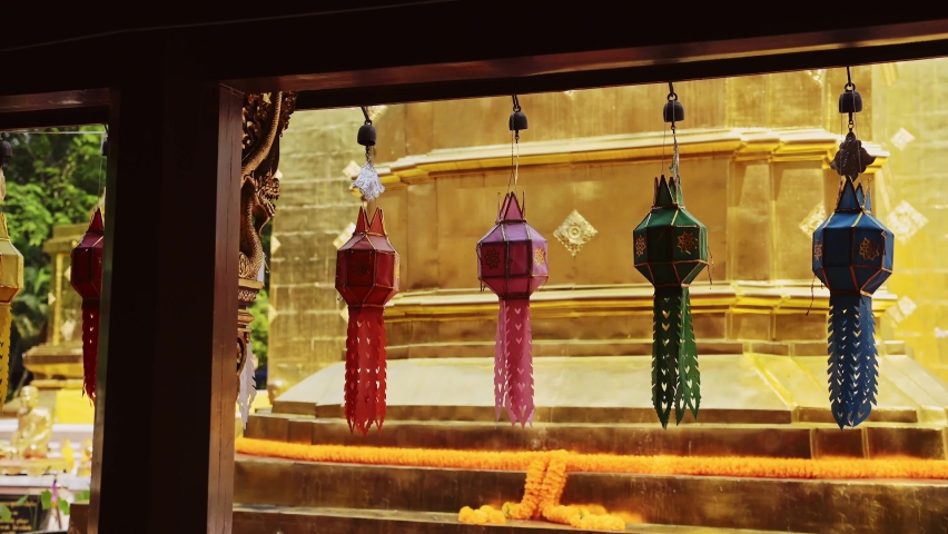 Colourful Prayer Lanterns Hanging at a Thailand Buddhist Temple at Chiang Mai, Wat Phra Singh, Used for Religious Ceremonies with Gold at a Beautiful Famous and Popular Place to Visit Royalty-Free Stock Footage #1092887105