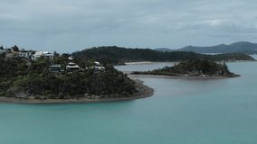 Coastal view of Whitsunday islands at Shute Harbour in Australia. Aerial drone pov