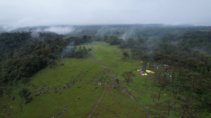 Aerial View. Bolaven Plateau in Laos has vast grasslands, pine forests, and beautiful nature. Royalty-Free Stock Footage #1092904439