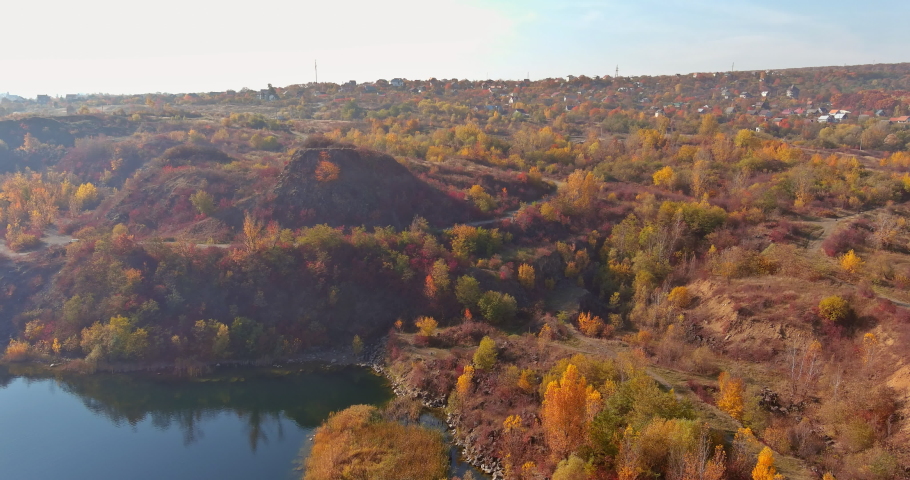 It is a quarry pond, formed after mining stone, with clear clear turquoise water in lagoon the near small village
