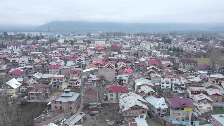Track in aerial shot of colorful Srinagar city of Jammu and Kashmir state, India Royalty-Free Stock Footage #1092910319