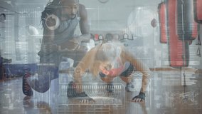 Animation of data processing over caucasian female boxer with african american coach at gym. Global sport and digital interface concept digitally generated video. - Powered by Shutterstock - Get 15% off with code: PIKWIZARD15