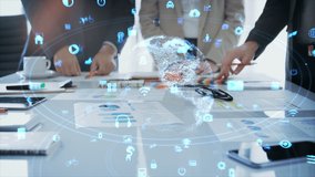 Group Of Young Business People Discussing Brainstorming Ideas. Financial Data And Charts, Tech Devices. Hand Close Up. Boardroom Meeting with Holographic Rotating Earth with Technology Icons. IOT, AR. - Powered by Shutterstock - Get 15% off with code: PIKWIZARD15