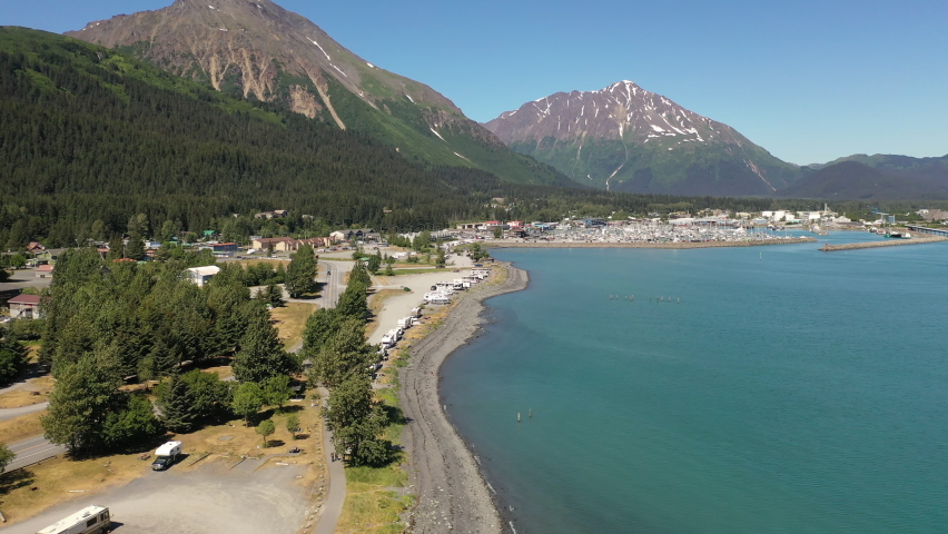 Aerial view of port city Seward, Alaska.  Campground, travel trailers, RVs parked along the coastline. 