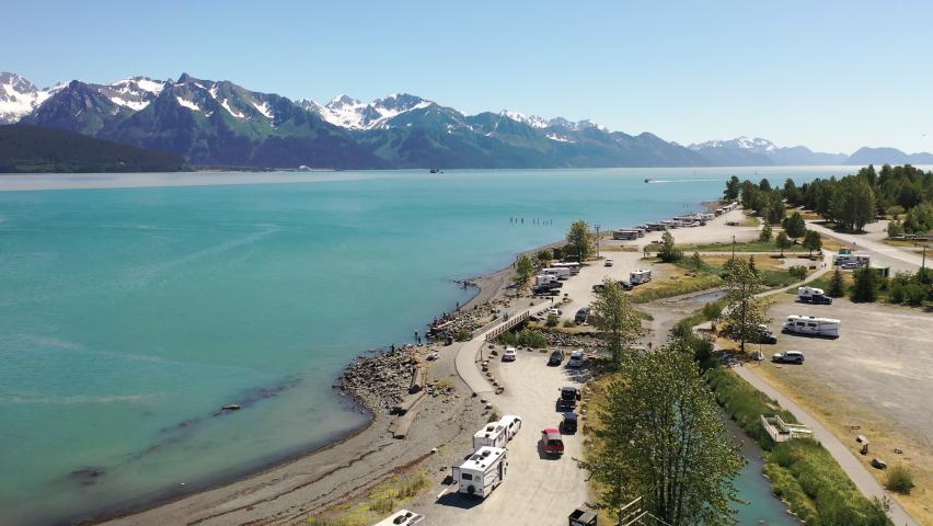 Aerial view of port city Seward, Alaska.  Campground, travel trailers, RVs parked along the coastline. 
