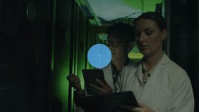 Animation of laptop and phone icons connecting with lines over multiracial coworkers in server room. Digital composite, multiple exposure, internet of things, data center, networking and technology. - Powered by Shutterstock - Get 15% off with code: PIKWIZARD15