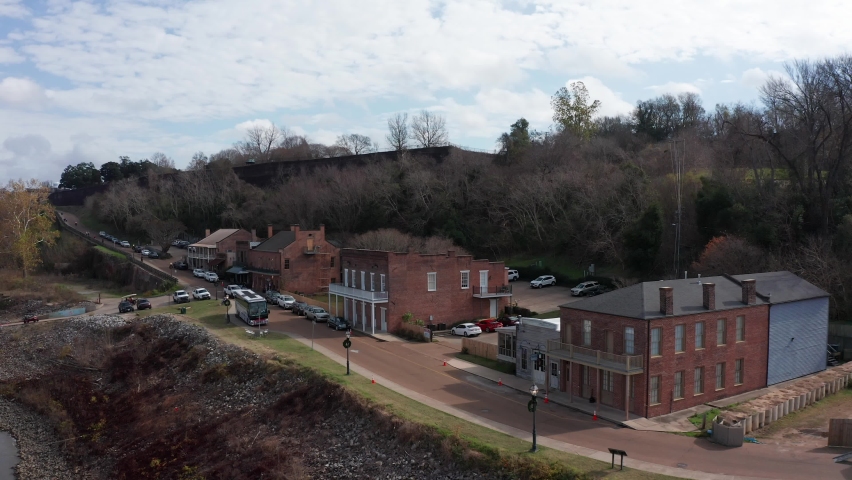 Close-up aerial shot dollying along Natchez Under-The-Hill in Natchez, Mississippi. 4K