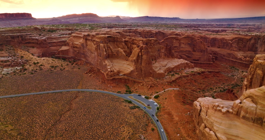 Approaching the amazing rocks of Zion Canyon in national park of Utah, USA. Huge territory of canyon stretching up to pink skies. Top view.