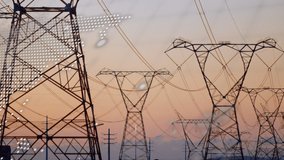 Animation of data processing and world dmap over electricity pylons. Global sustainability, electricity, connections, data processing and digital interface concept digitally generated video. - Powered by Shutterstock - Get 15% off with code: PIKWIZARD15