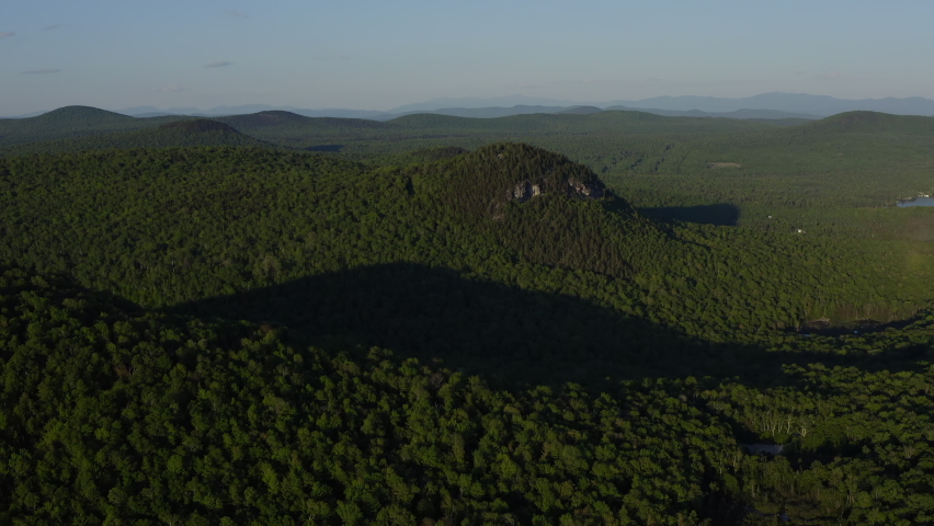 Sweeping panoramic view of green mountains. Aerial shot of Vermont mountains. Vermont mountains panoramic view. | Shutterstock HD Video #1092982613