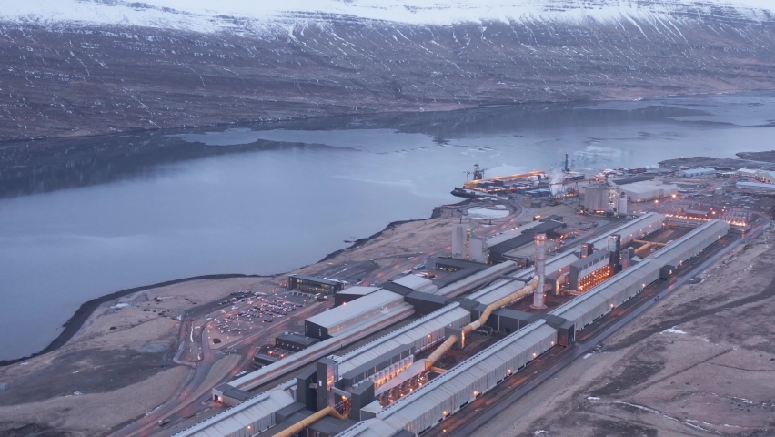 Alcoa Fjardaál aluminium smelter industry factory on shore of Reyðarfjörður Royalty-Free Stock Footage #1092982675