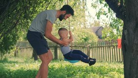 Happy Family Father And Child Boys Leisure. Son Boys Swing Rides Happiness. Cute Little Kid Having Fun. Carefree Dad With Preschool Sons Enjoy Activity Adventure. Family Parent Holidays Relationship - Powered by Shutterstock - Get 15% off with code: PIKWIZARD15