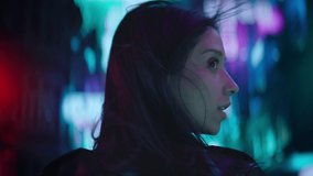 CU Portrait of Hispanic female using her VR metaverse headset in the street full of neon lights, Hong Kong asian style background - Powered by Shutterstock - Get 15% off with code: PIKWIZARD15