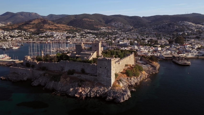 Bodrum is a city on the Bodrum Peninsula, stretching from Turkey's southwest coast into the Aegean Sea.	 Royalty-Free Stock Footage #1093008197