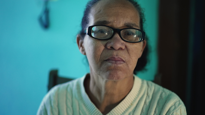 An African American senior woman portrait closeup face. A black elderly hispanic person | Shutterstock HD Video #1093010951