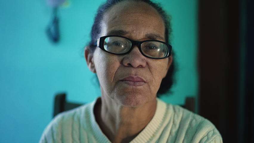 An African American senior woman portrait closeup face. A black elderly hispanic person Royalty-Free Stock Footage #1093010951