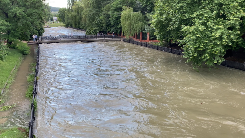 Flooded embankment of the Salgir river in Simferopol, Crimea, Russia. Due to heavy rainfall and rising water levels in the Simferopol reservoir, water discharge into the Salgir River.