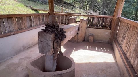 Monjolo - primitive water-driven device used for pounding grains. Very commom at countryside of Brazil, specially Minas Gerais.