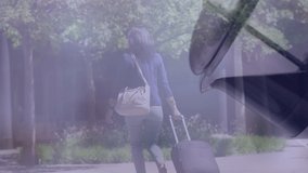 Composite video of tea pouring out of kettle against businesswoman with trolley bag walking. School and education concept