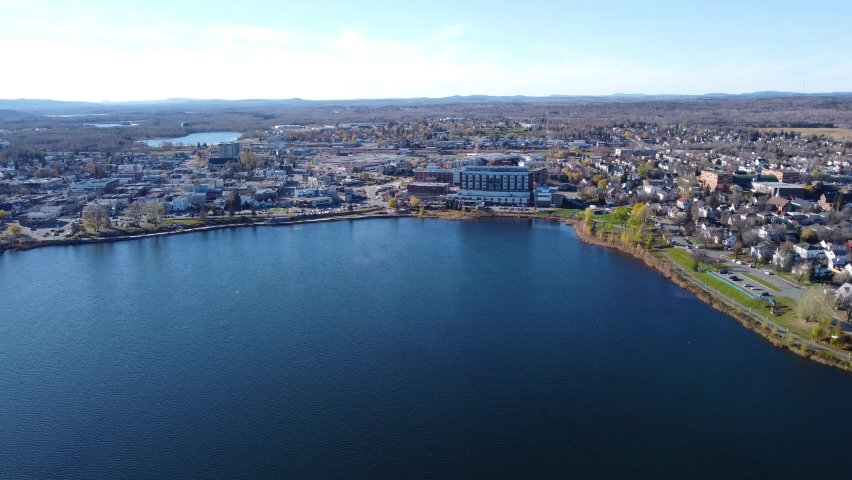 Aerial view of Rouyn-Noranda City and Osisko Lake in a fall season sunny day. Abitibi-Temiscamingue, Quebec, Canada.
