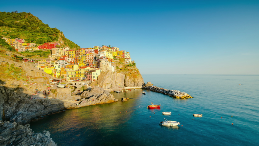 Panoramic Day to Night Sunset Time Lapse of beautiful town of Manarola in Cinque Terre, Manarola, Liguria, Italy Royalty-Free Stock Footage #1093032995