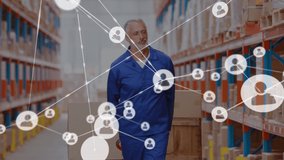 Animation of network of people icons over caucasian man working in warehouse moving boxes. Global communication network, business and digital interface concept digitally generated video. - Powered by Shutterstock - Get 15% off with code: PIKWIZARD15