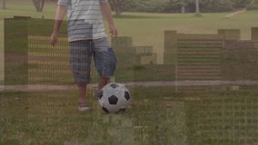 Animation of graphs and financial data over legs of male soccer player with ball on field. Sport, soccer, finance and economy concept digitally generated video.